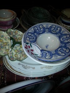 This bowl was used for shaving.  The cut-out area would be placed under the chin and the bowl would catch the shavings.