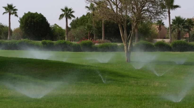 The sprinklers look quite 'ghostly' in this photo.